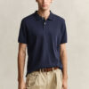 Camisa polo em malha interlock