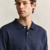 Camisa polo em malha interlock