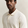Camisa polo em malha interlock