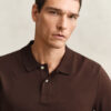 Camisa polo em malha interlock