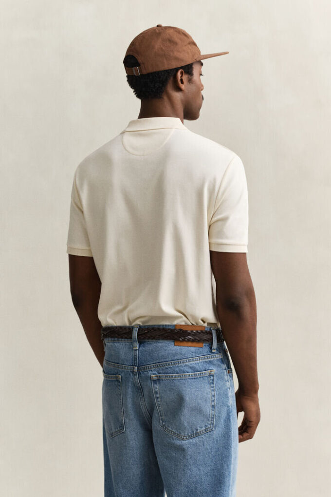Camisa polo em malha interlock