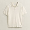 Camisa polo em malha interlock