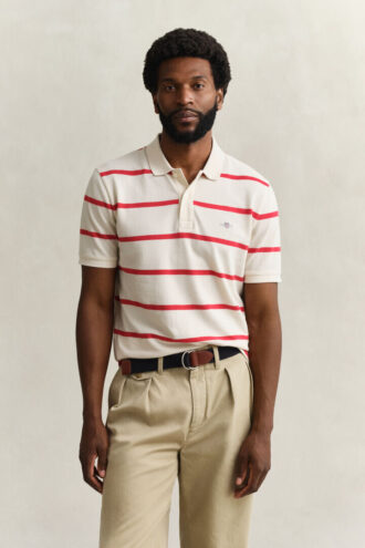 Camisa polo às riscas