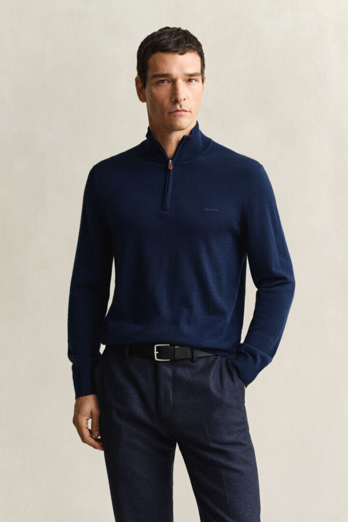 Camisola com meio fecho em lã merino extra fina