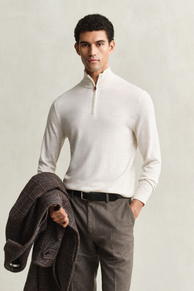 Camisola com meio fecho em lã merino extra fina