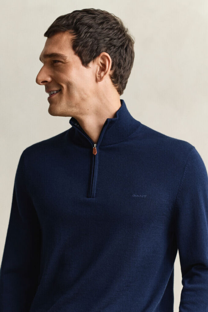 Camisola com meio fecho em lã merino extra fina