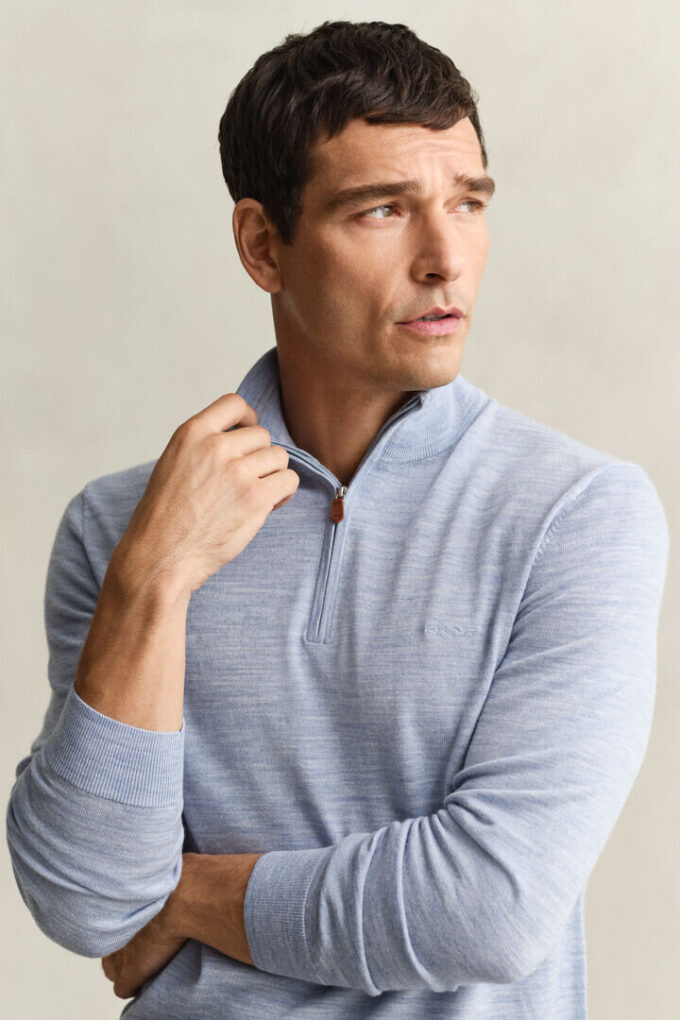 Camisola com meio fecho em lã merino extra fina