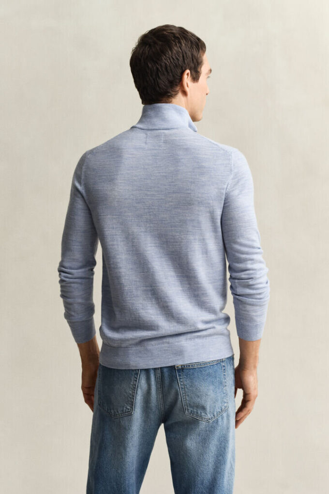 Camisola com meio fecho em lã merino extra fina