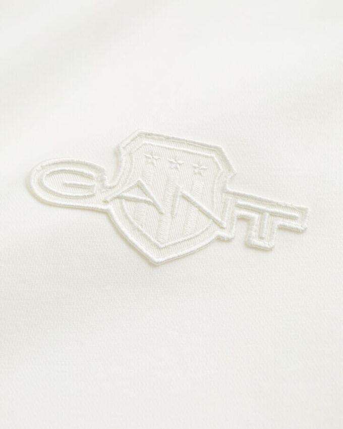 Camisola de gola redonda com emblema tonal