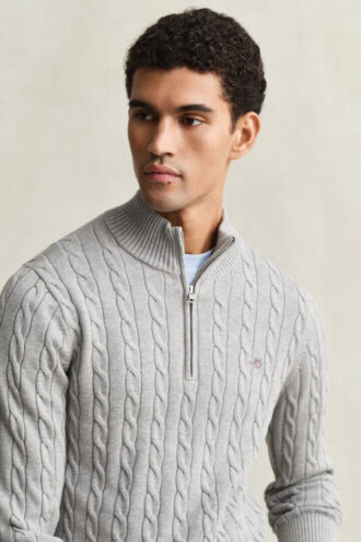 Camisola de malha trançada com meio fecho