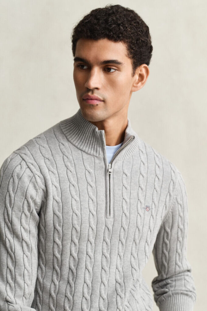 Camisola de malha trançada com meio fecho
