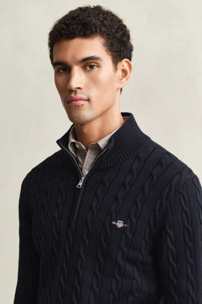 Camisola de malha trançada com meio fecho