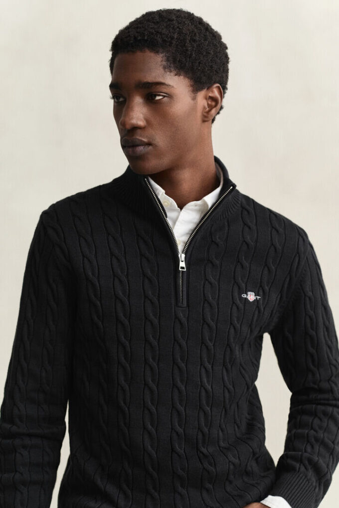 Camisola de malha trançada com meio fecho