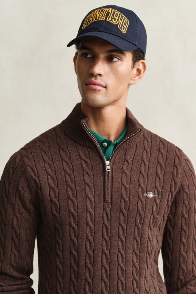 Camisola de malha trançada com meio fecho