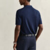 Camisola polo de calções em lã merino extra fina