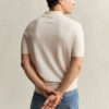 Camisola polo de calções em lã merino extra fina