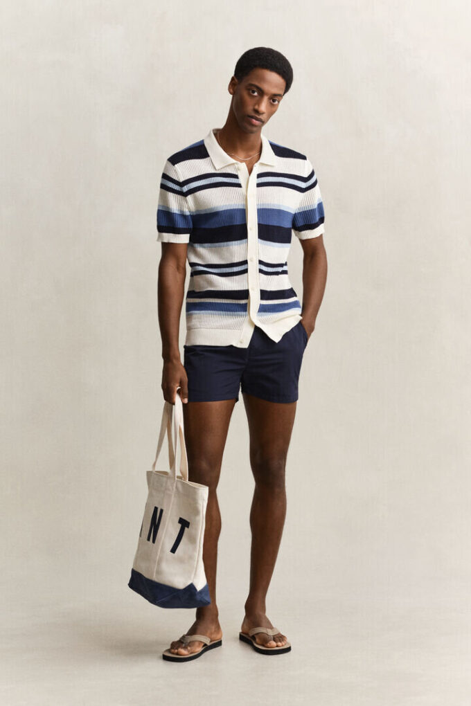 Camisola polo às riscas