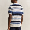 Camisola polo às riscas