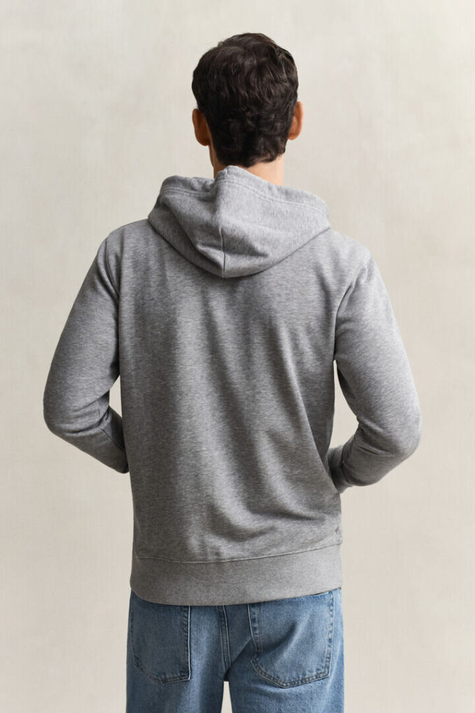 Hoodie com fecho e escudo