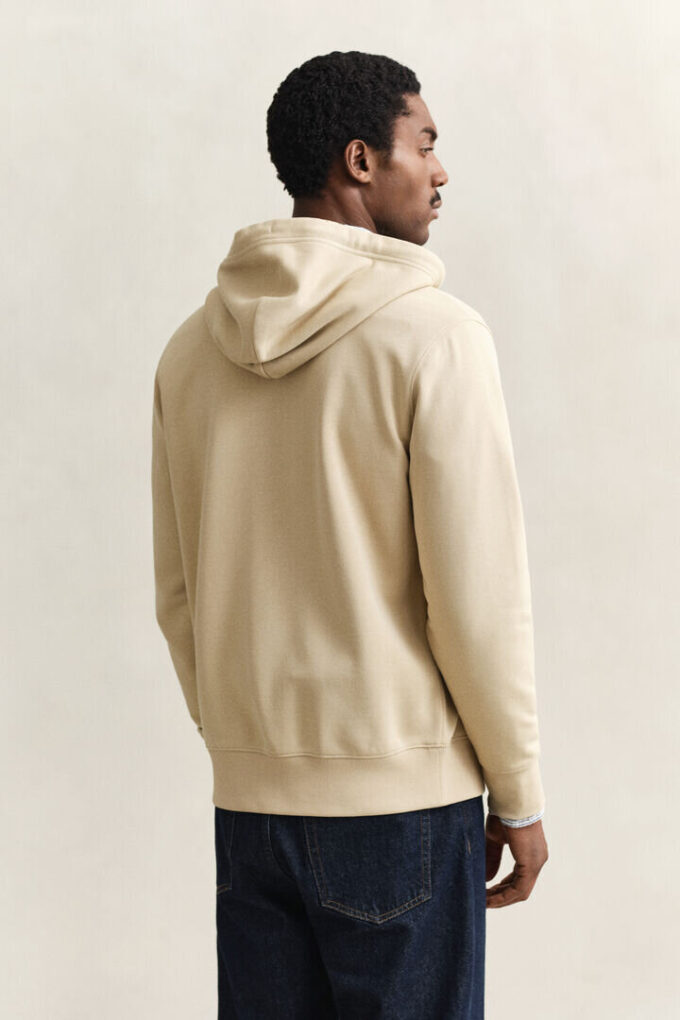 Hoodie com fecho e escudo