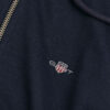 Hoodie com fecho e escudo