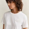 T-shirt com emblema tonal