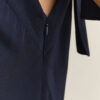 Vestido justo com corte em viés